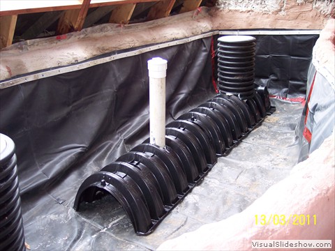 Infiltrators and inspection tubes in garden