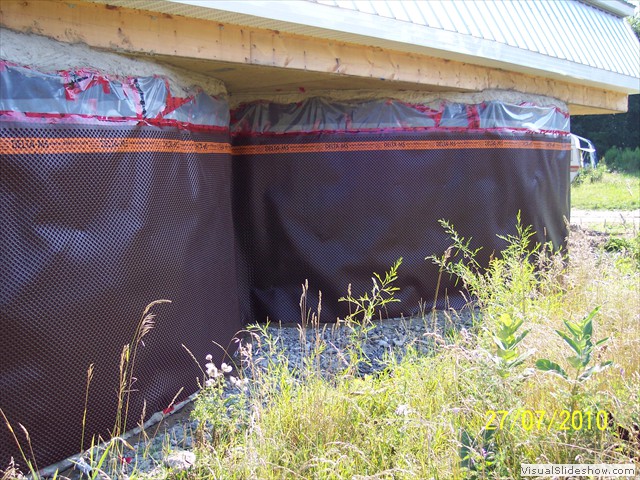 Water proofing membrane before berming